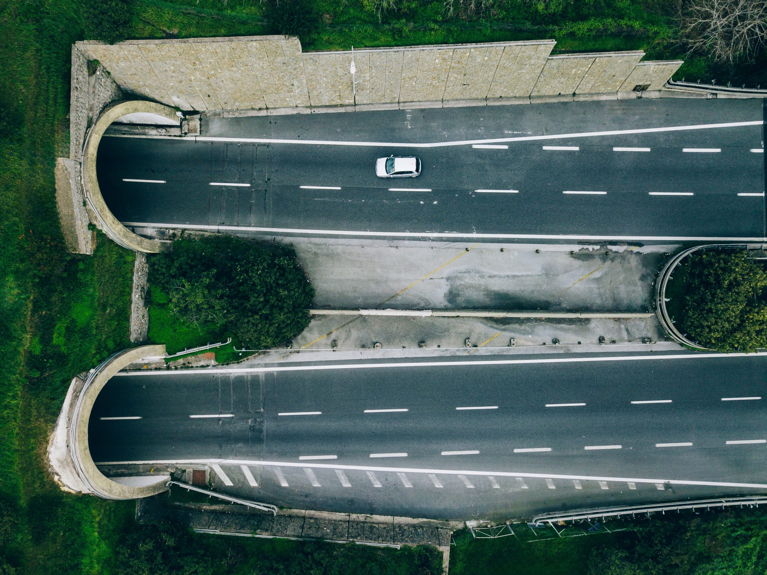 Aerial,View,Of,Highway,Road,Tunnel,In,Mountains,,Italy.